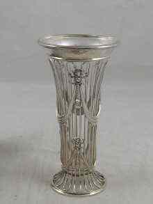 Appraisal: A silver wirework vase with glass liner by Nathan and