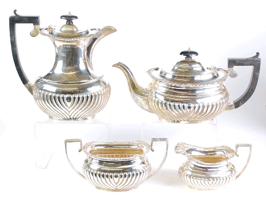 Appraisal: A MATCHING BUT COMPOSITE FOUR PIECE SILVER TEA SERVICE each