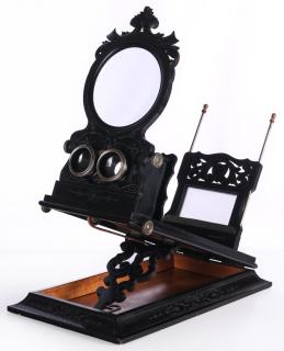 Appraisal: A TH CENTURY FRENCH FOLDING STEREO GRAPHOSCOPE The ebonised case