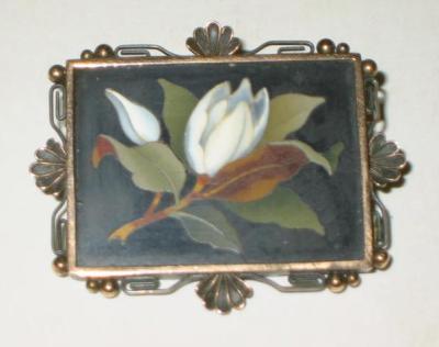 Appraisal: A PIETRA DURA BROOCH the oblong panel inlaid with a