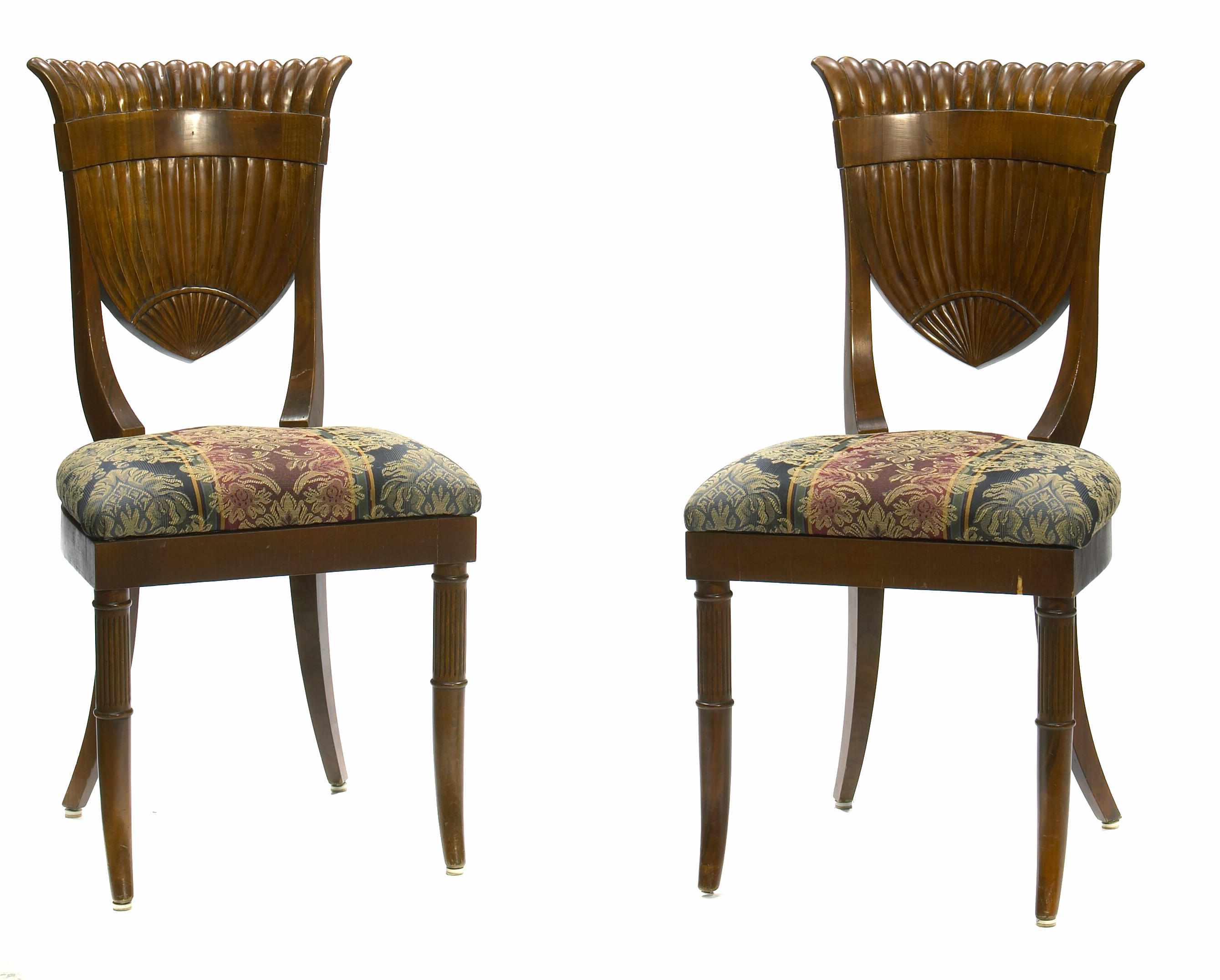 Appraisal: A set of four Biedermeier walnut side chairs height in