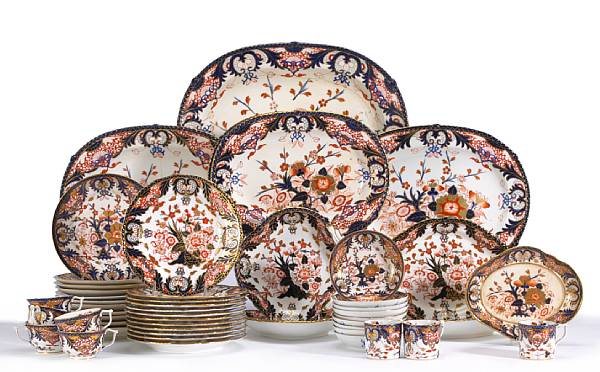 Appraisal: An assembled Crown Derby porcelain and earthenware dinner service in