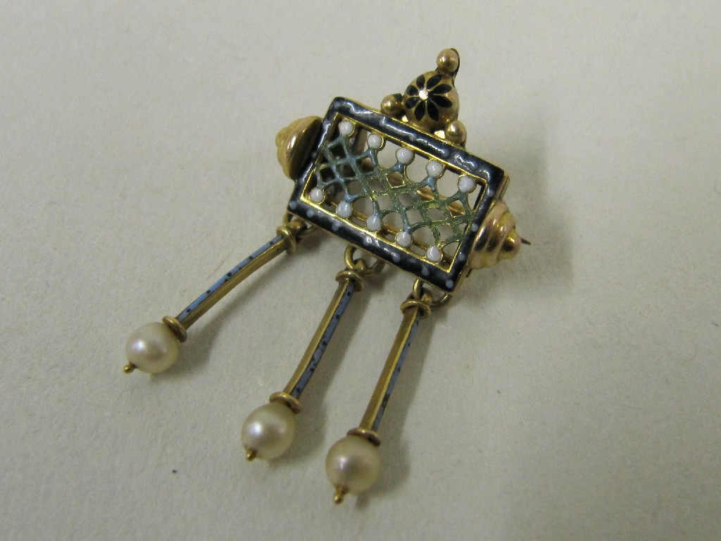 Appraisal: Edwardian yellow metal enamel and pierced decorated brooch