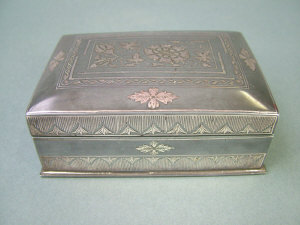 Appraisal: An Indian bidriware rectangular box and cover with foliate decoration