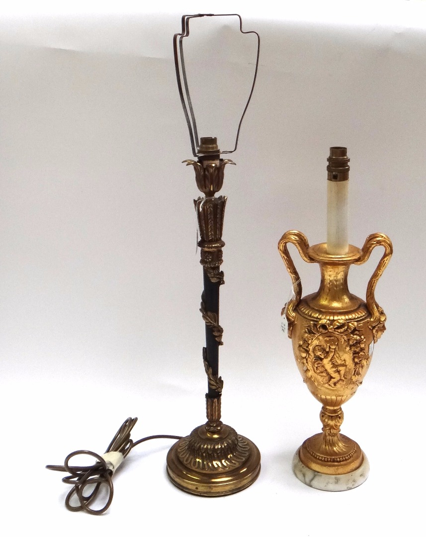 Appraisal: A Victorian style gilt bronze table lamp modelled as a