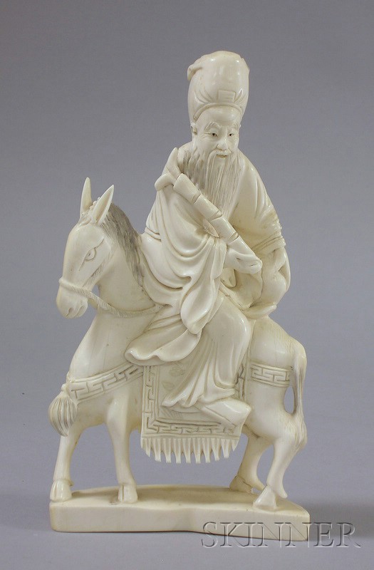 Appraisal: Chinese Carved Ivory Figure of an Immortal Riding a Donkey