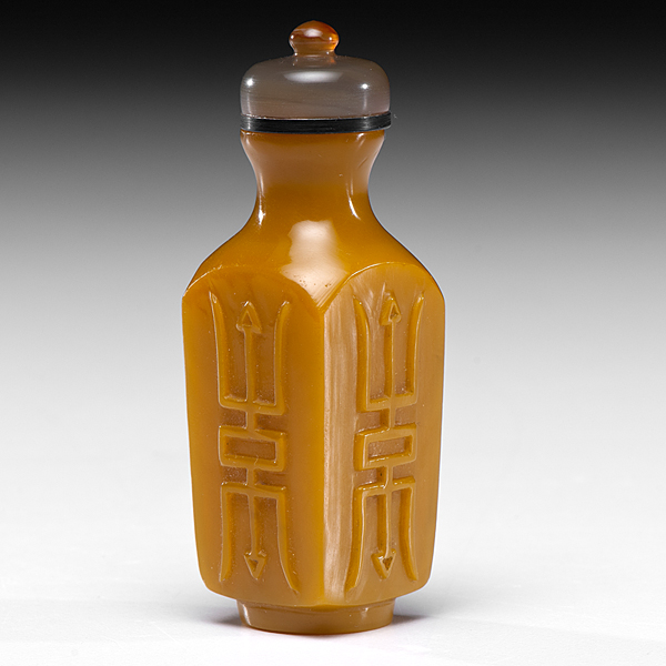 Appraisal: Chinese th century A yellow elongated and square snuff bottle