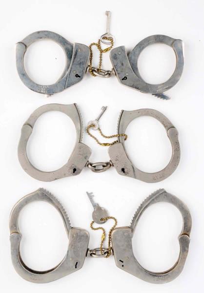 Appraisal: Lot Of Handcuffs First cuff is a Spanish Chief of