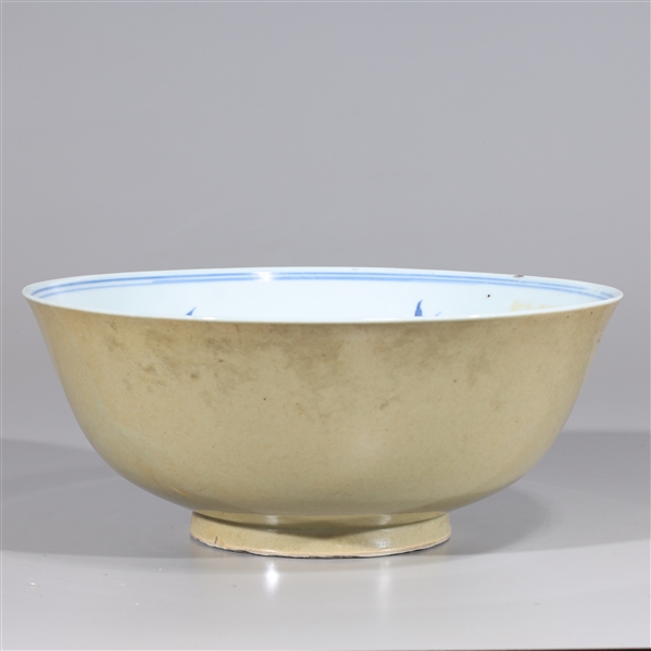 Appraisal: Large Chinese porcelain bowl with blue and white interior ochre