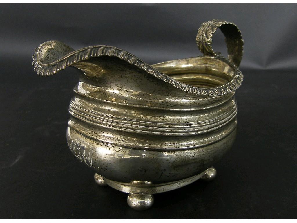 Appraisal: Early George IV silver sauceboat with gadrooned rim acanthus moulded