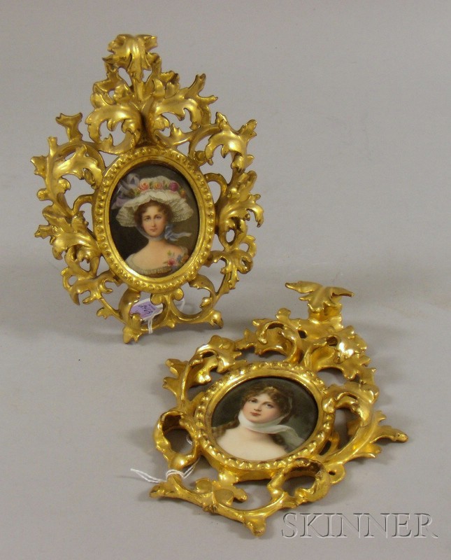 Appraisal: Two Carved Giltwood-framed Oval Miniature Hand-painted Portraits of Young Women