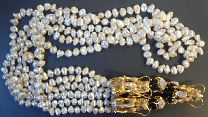 Appraisal: K yg Dragon Decorated Strand of Pearls triple strand of