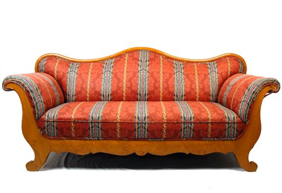 Appraisal: A Sofa in the Biedermeier Taste having a serpentine crest