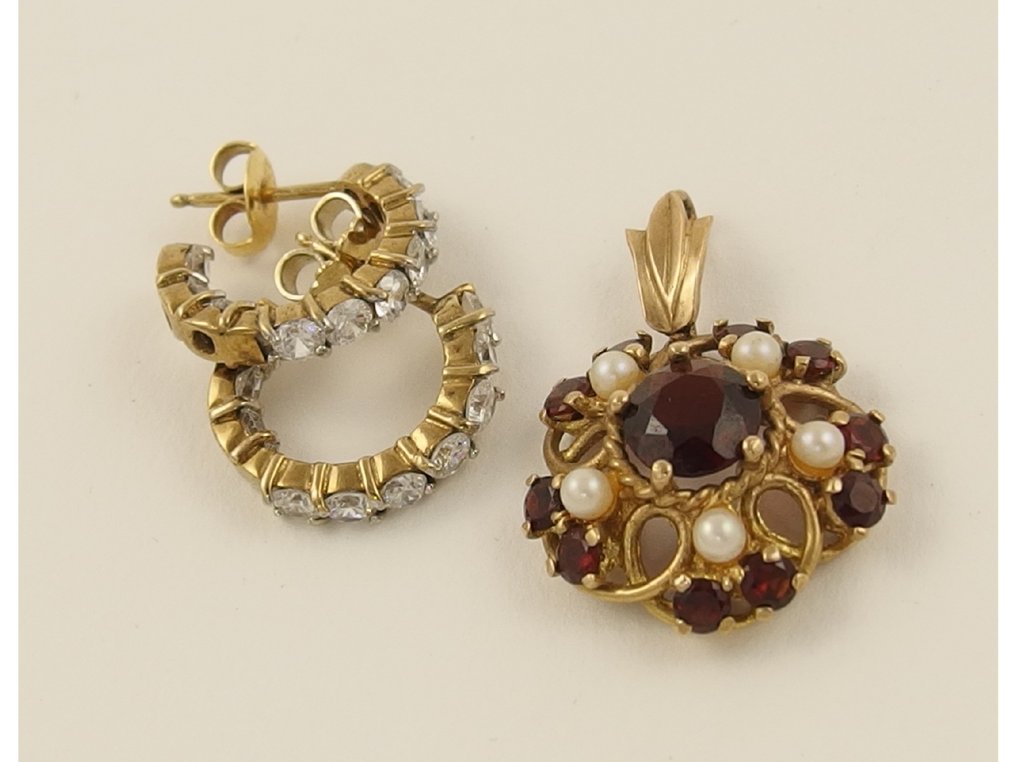 Appraisal: A ct garnet and pearl pendant together with a pair