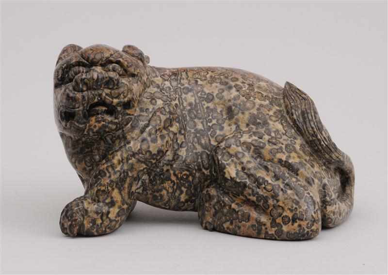 Appraisal: CHINESE CARVED HARDSTONE FIGURE OF A RECUMBENT FU DOG With