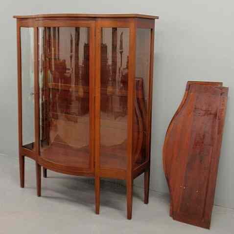 Appraisal: Hepplewhite style inlaid mahogany bow-front vitrine c with three shelves