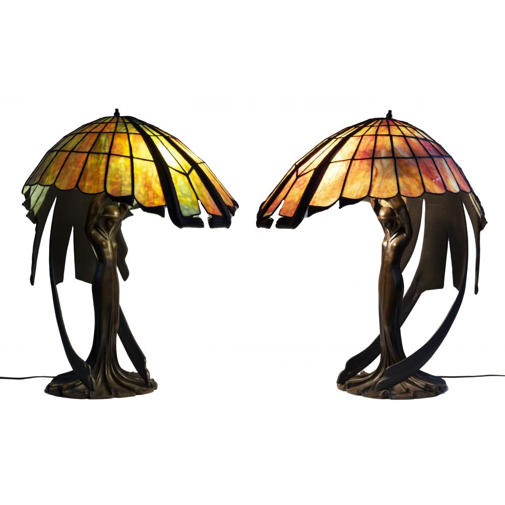 Appraisal: BRONZE AND ACRYLIC TABLE LAMPS art nouveau style lamps each