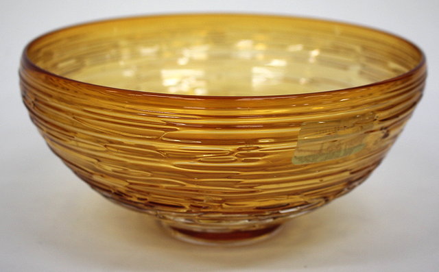 Appraisal: A FIRST GLASS MOULDED AMBER GLASS BOWL with engraved signature