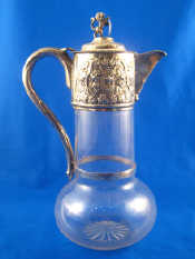 Appraisal: A Victorian silver mounted claret jug the clear glass cylindrical