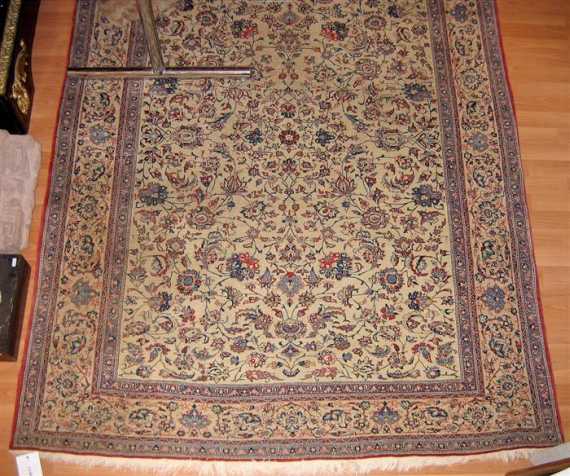 Appraisal: NAIN old Beige central field entirely patterned with trailing flowers