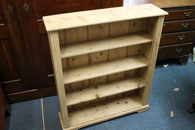 Appraisal: A PINE OPEN BOOKCASE fitted three shelves cm wide