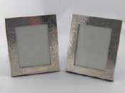 Appraisal: A pair of silver birth record photo frames x cm