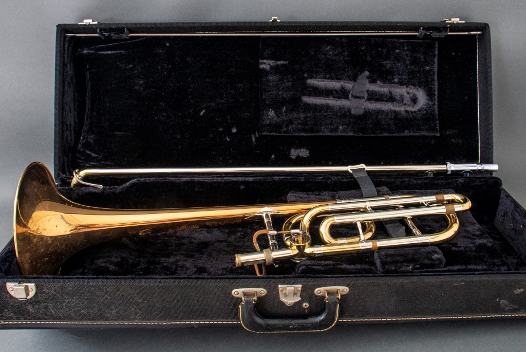 Appraisal: HOLTON TROMBONE WITH CASE Gilt trombone by Holton marked TR