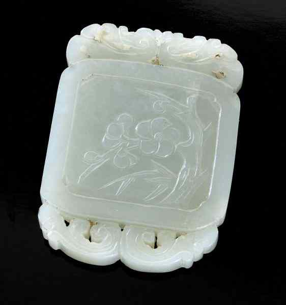 Appraisal: Chinese Qing carved white jade pendant one side depicting plum