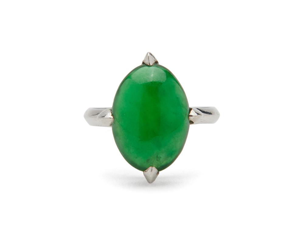 Appraisal: Platinum and Jadeite Ring centering a four-prong basket-set oval cabochon