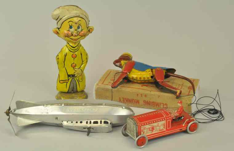 Appraisal: VARIOUS TIN TOY GROUPING Assorted lot includes Red tractor w