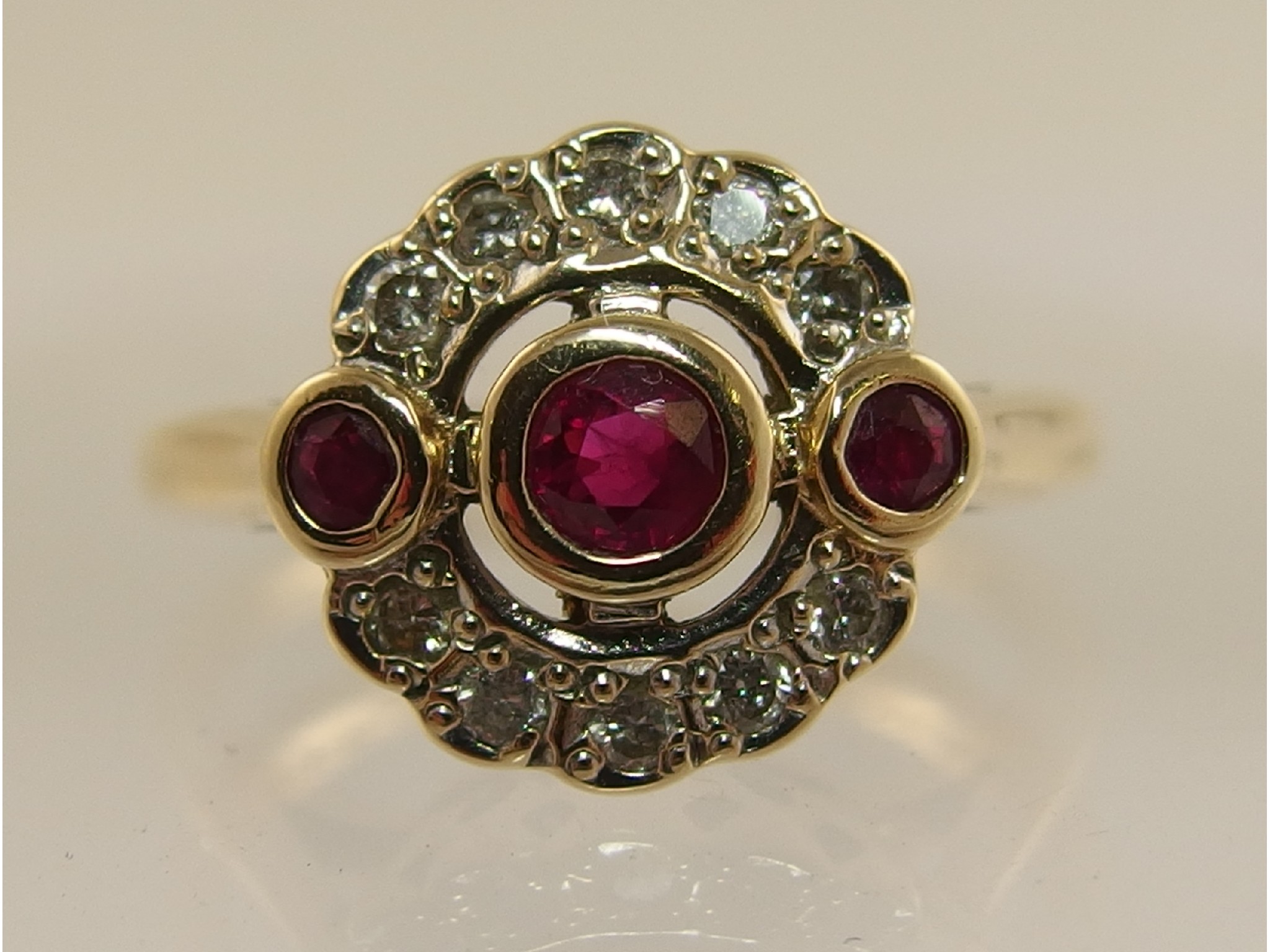 Appraisal: A ct red gem and diamond ring