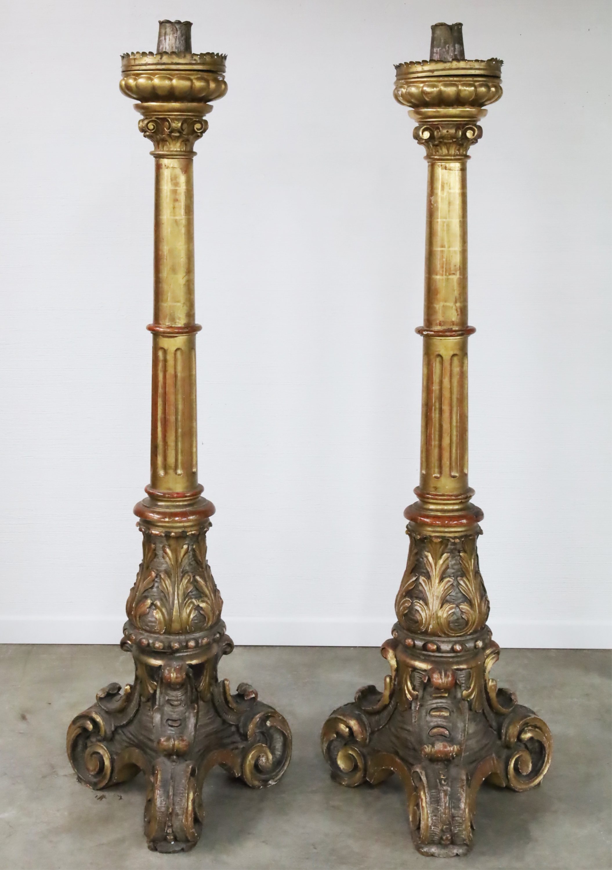 Appraisal: ITALIAN BAROQUE GILT WOOD TORCHIERES TH C Pair of impressive