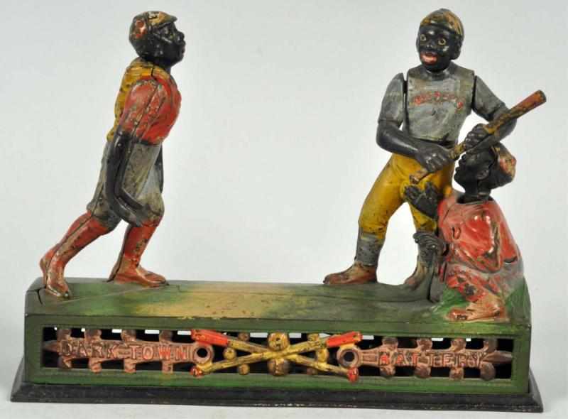 Appraisal: Cast Iron Darktown Battery Mechanical Bank Manufactured by J E