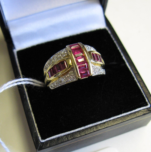 Appraisal: RUBY DIAMOND AND FOURTEEN KARAT GOLD RING set with rectangular