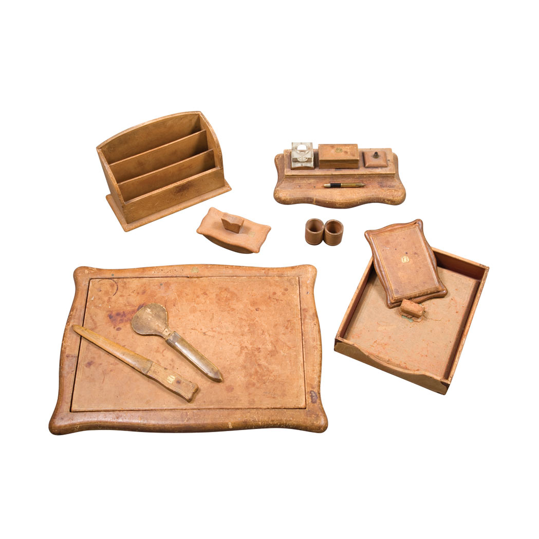 Appraisal: English Embossed Leather Ten-Piece Desk Set Some pieces with an