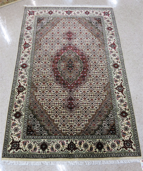 Appraisal: HAND KNOTTED ORIENTAL AREA RUG Persian Bidjar design central medallion