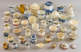 Appraisal: Collection of th century English pottery including cups and miniature