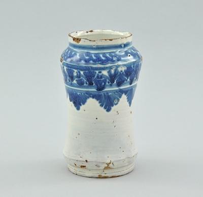 Appraisal: An Early Persian Apothecary Jar The circular lidless jar with