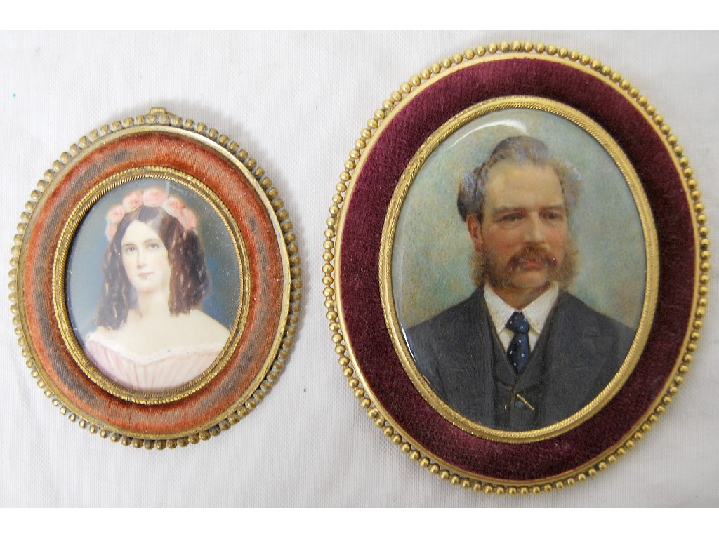 Appraisal: A Victorian oval portrait miniature of a young lady in