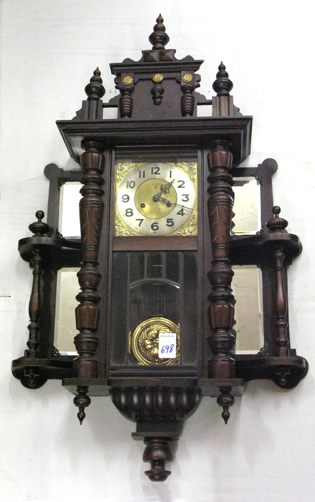 Appraisal: AN UNUSUAL WALNUT CASE WALL CLOCK German early th century