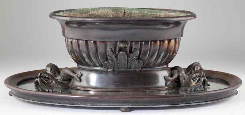 Appraisal: French Bronze Dolphin Plantercirca bronze and copper oval planter with