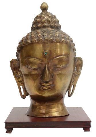 Appraisal: Bronze Buddha head bust having a turquoise stone inset in