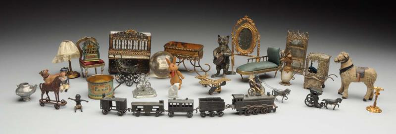 Appraisal: Large Lot Of Antique Miniatures Soft metal piano sedan chair