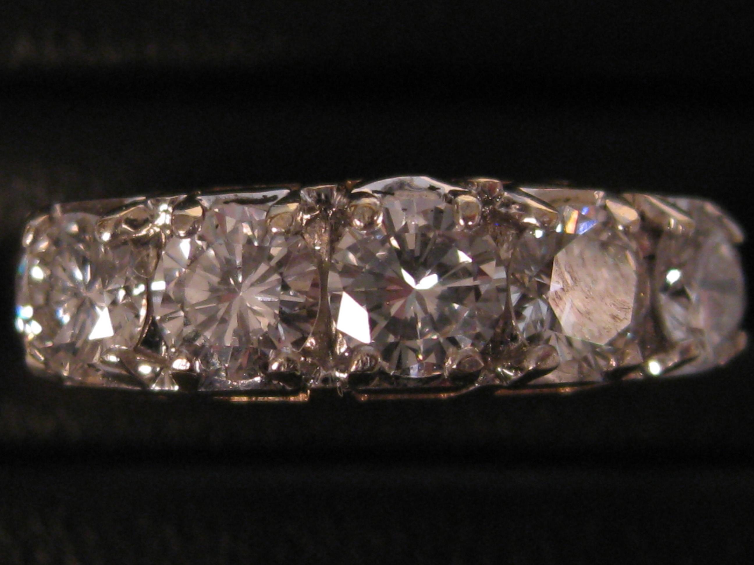 Appraisal: A five stone Diamond Ring the brilliant-cut stones claw-set approx