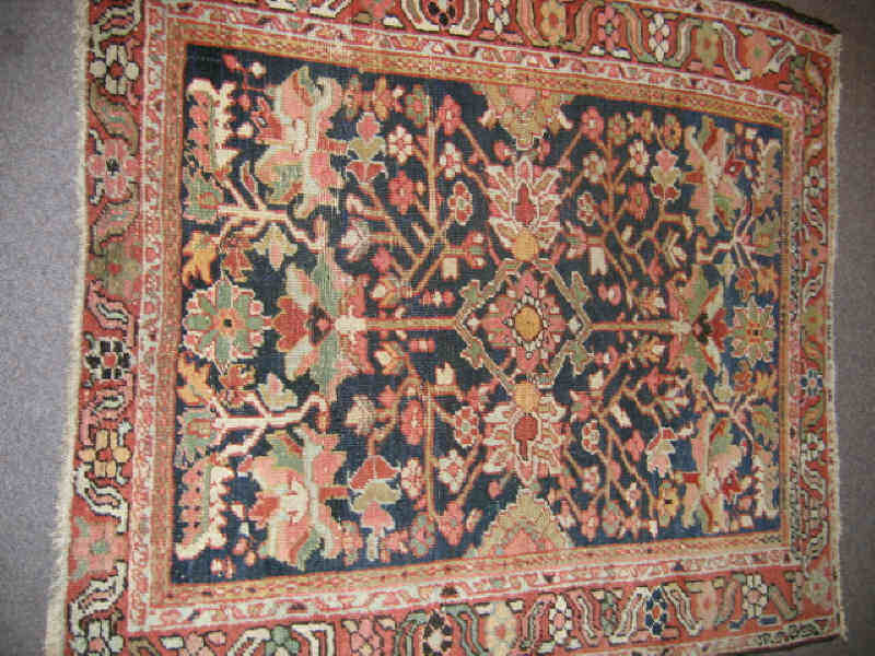 Appraisal: EARLY TH CENTURY HERIZ THROW RUG The indigo field shows