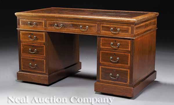 Appraisal: An Edwardian Inlaid Mahogany Kneehole Desk c retains original tooled