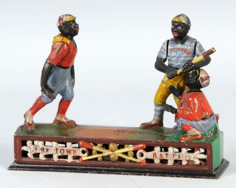 Appraisal: Cast Iron Darktown Battery Mechanical Bank Description Manufactured by J