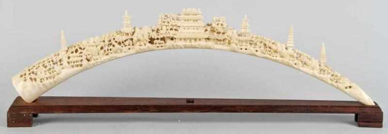 Appraisal: Large Carved Ivory Tusk Description Very intricately carved scene Includes