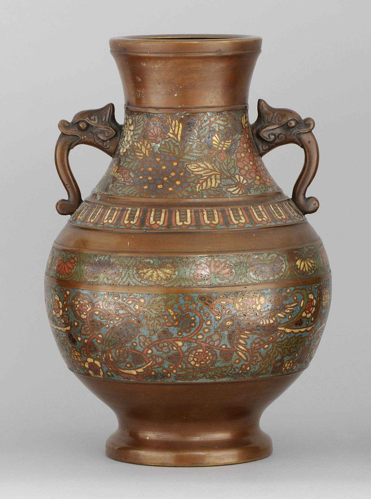 Appraisal: CHAMPLEV ENAMEL-ON-BRONZE VASE Taisho Period In ovoid form with dragon's-head