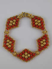 Appraisal: A yellow metal tests carat gold coral bracelet approx cm